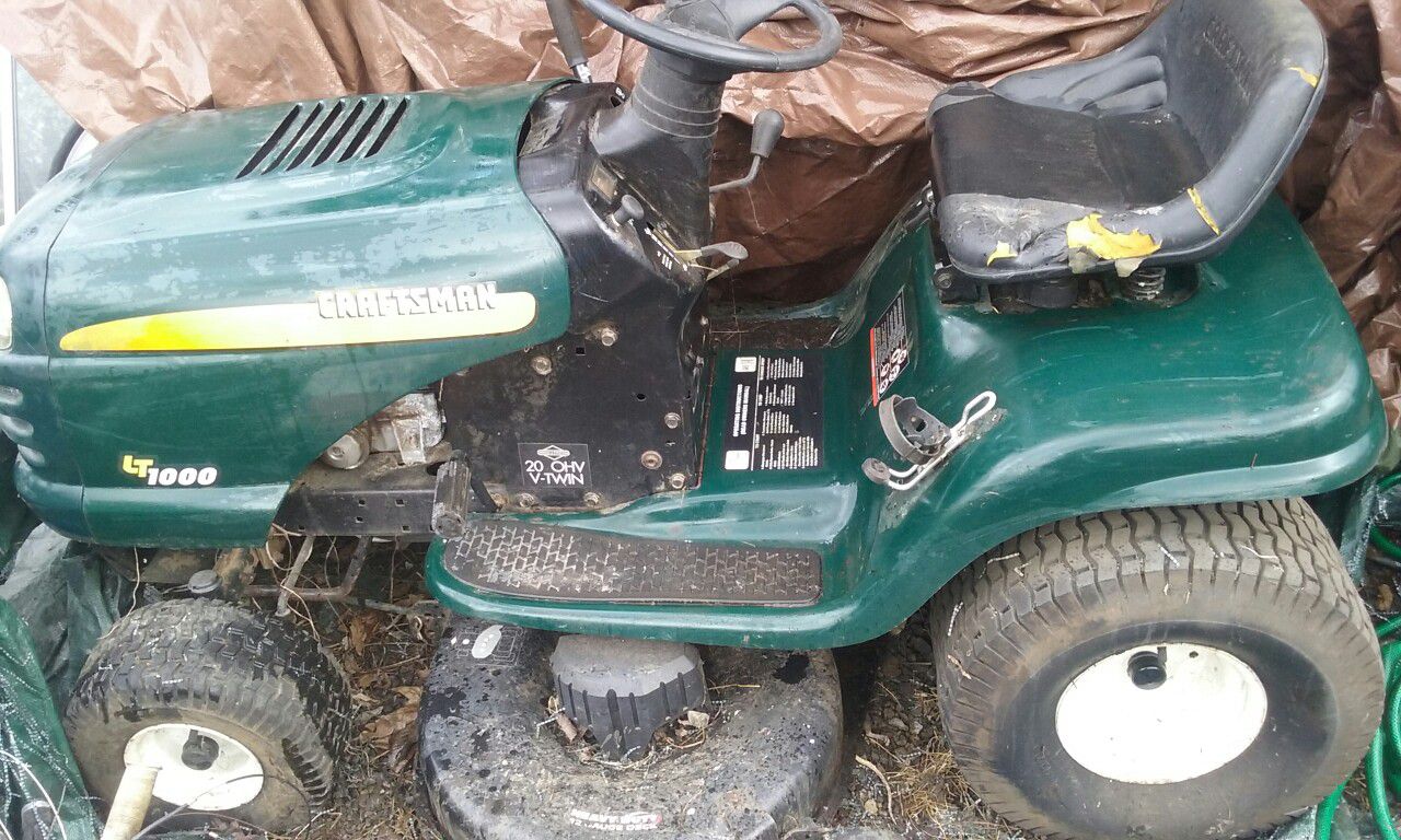 Craftsman riding lawn mower,in bad tune,may need serious repair,{contact info removed}