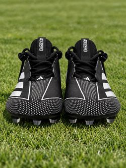 Never worn Adidas football cleats