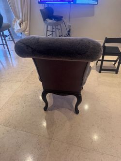 Gray Upholstered High-Back Accent Chair – $175