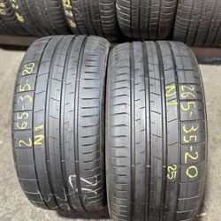 20” tires pirelli 265/35/20 semi new with free installation $200 both
