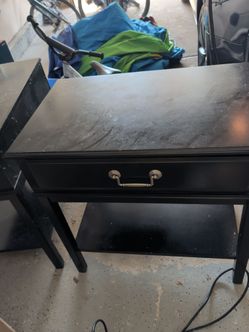 Two Basset black bed side tables