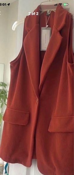 New sleeveless blazer
