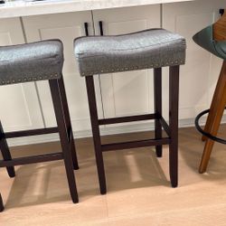 Two Bar Stools - Brown Legs And gray Cushion 