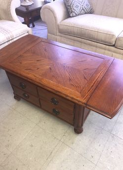 Center table w/collapsible ends and storage cabinet