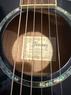 Ibanez electric acoustic guitar with roadrunner guitar travel case