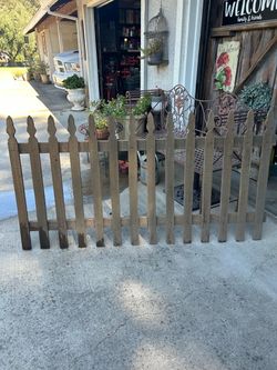 Rustic Wooden Picket Fence Section