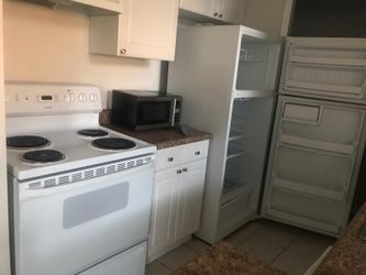 Kitchen, Fridge and microwave whirlpool.