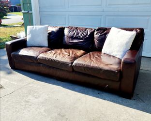 Gorgeous Deep leather Couch Delivery Available