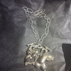 Vintage silver body pin with 10 charms