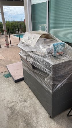 Charcoal smoker grill with built in wheel caddy