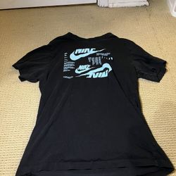 Black Nike Shirt Light Blue Text