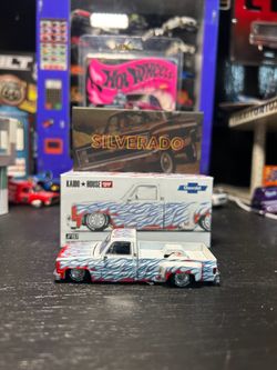 Kaido house white dually Silverado