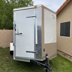 Brand new V-Nose cargo trailer 6x12SA in very good quality two-tone ready for you to start your business