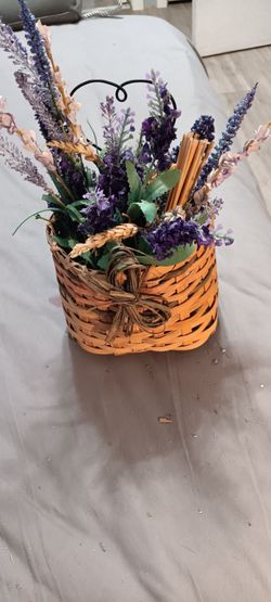 WICKER HANGING BASKET WITH FAKE FLOWERS  MEASURES 16 1/2 ROUND, 5 - BASKET,  & 13 TALL