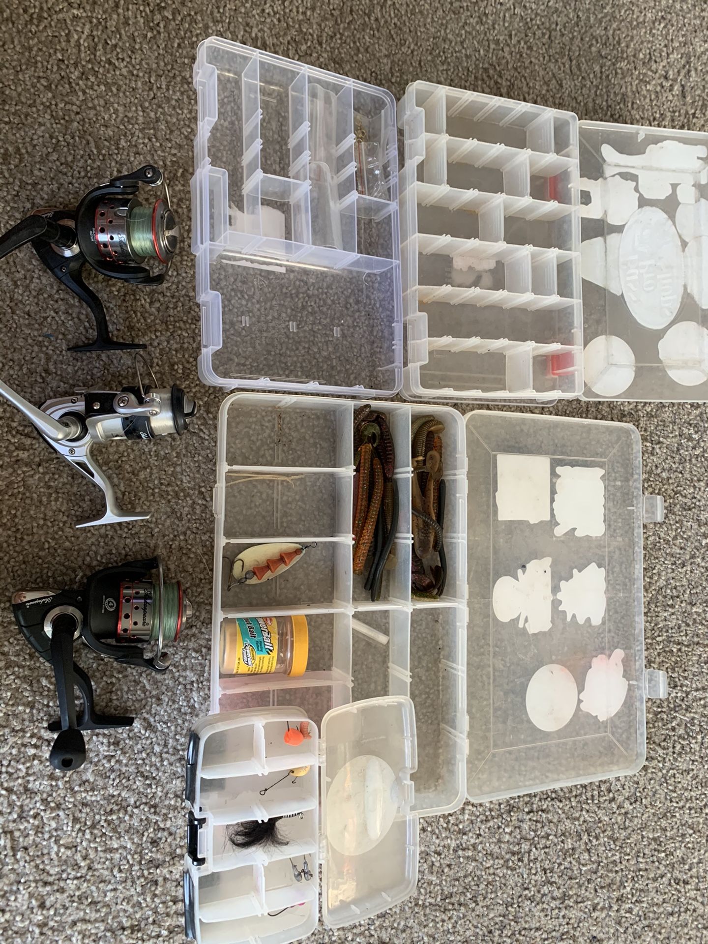 Miscellaneous fishing boxes and reels with some lures