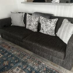 Grey Couch . Great Condition . No Tears 