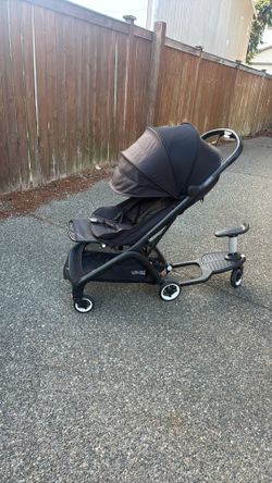 Used Bugaboo Umbrella Stroller With Skateboard Attachment