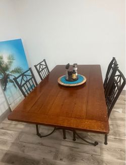 Wood and Wrought Iron Dining Table with Chairs