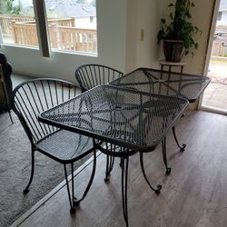 Is 2 black iron metal tables with chairs for $100  Is in perfect shape great for outdoors grilling or indoors