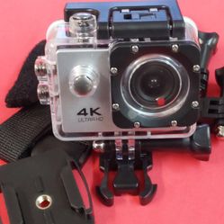 Silver 4K Sports Action Camera With Attachments 