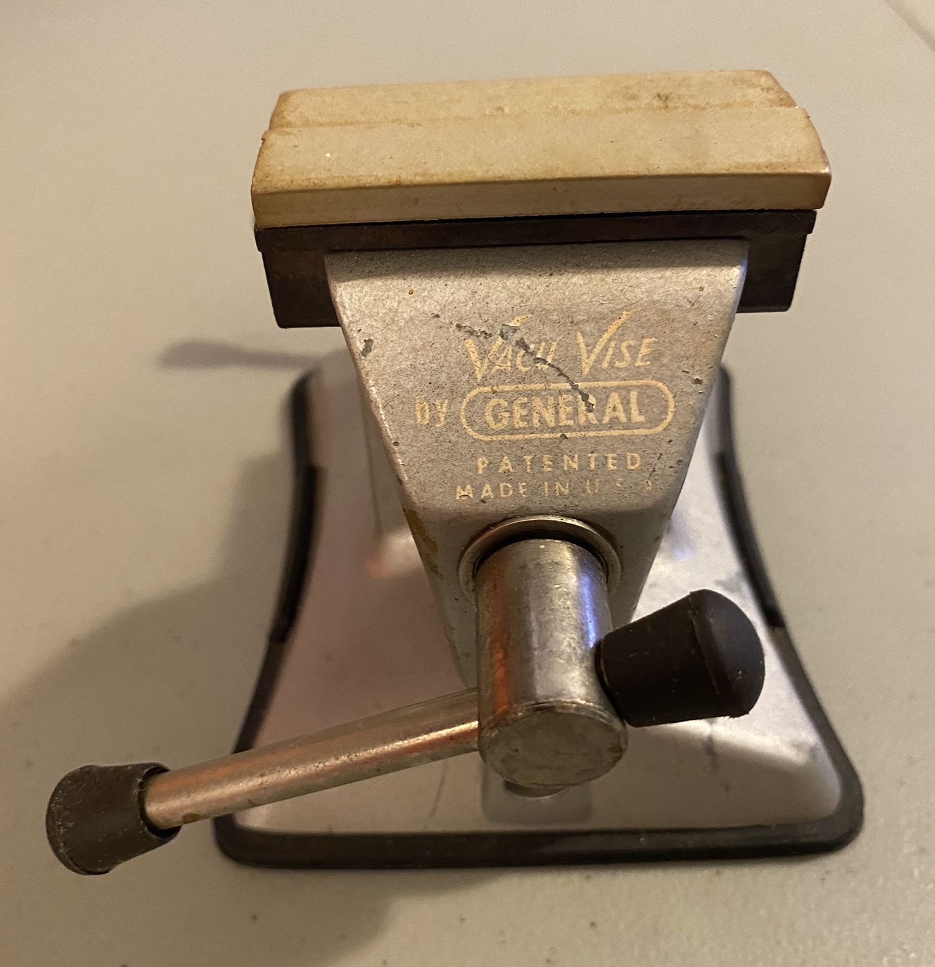 Vintage "Vacu Vise" By General Made In U.S.A . 2.5” Jaw Opening. 1.25” throat depth, 2.5” max opening. Includes jaw covers as shown. Owners marks engr