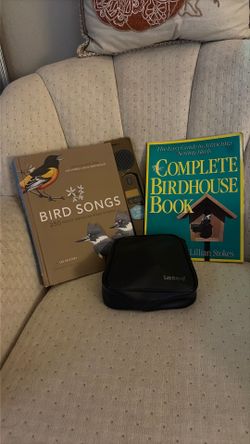 Tasco large binoculars ,  plus  2 bird books