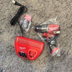 Milwaukee M12 Fuel Drill . Battery.charger