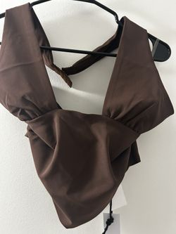 Tic Toc , brown top