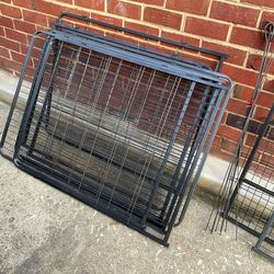 An almost new pet playpen ( 38” long x 30” high) 8 panels , very strong, complete with  all part( NO SHIPPING )