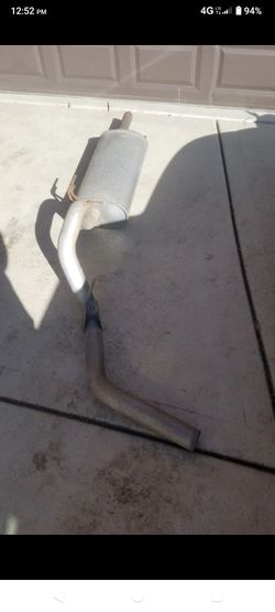 Muffler  and pipe assembly
