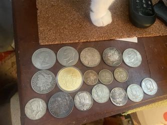 Assortment of old coins,  1964 quarters,,, 2000 p,,,  dollars,,,,,