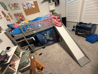 Bed with slide