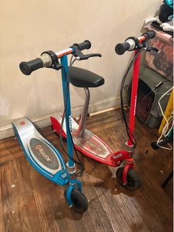 Two electric razor scooters as is