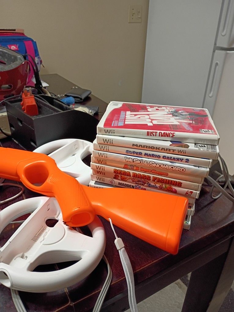 Wii 12 Games Barely Used Paid Over 500 For It