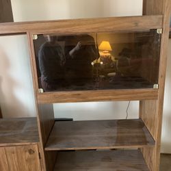 Large Vintage Entertainment Center With Plenty If Cupboards And Shelves For Storage. Also Has Lighted Area For Knick Knack Display.