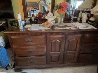 Solid Cherry Wood dresser, in very good condition. Plus a Recumbent bike I great condition. Asking $400.