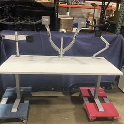 Monitor Arms! We Have Both Single And Dual Arms Available! We Also Have Standing Desks And Herman Miller Chairs Available!