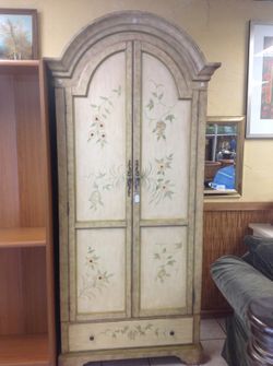 French designed armoire dresser with shelves and a drawer In great condition