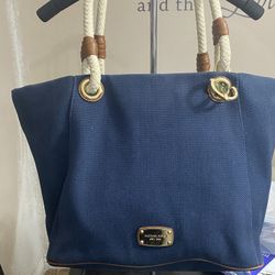 Michael Kors Marina large canvas tote bag in navy blue with rope handles. 