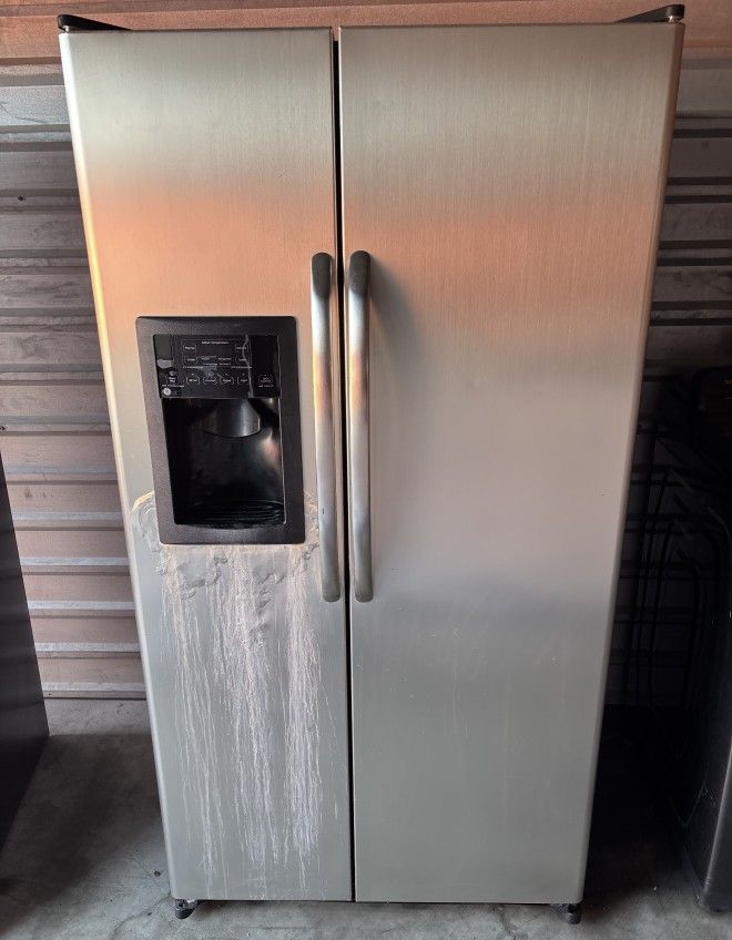 GE Stainless Steel Refrigerator And Freezer