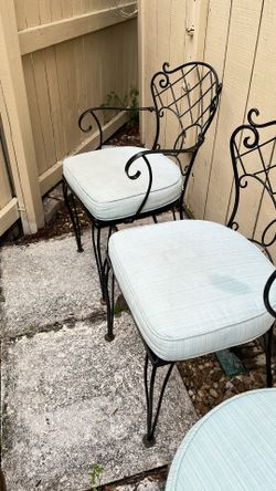 2 Wrought Iron Outdoor Chairs With Cushions 