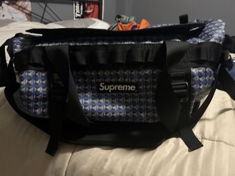 Supreme north face duffle bag