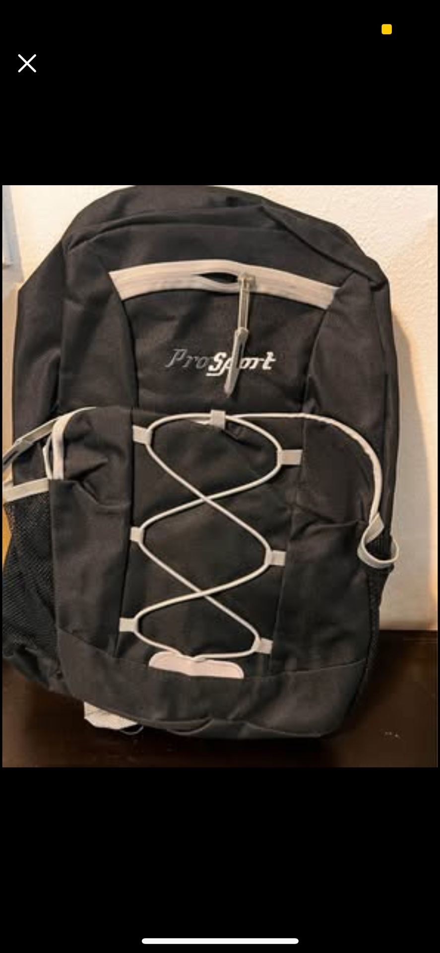 Black ProSport backpack with gray trim and front bungee cord design.