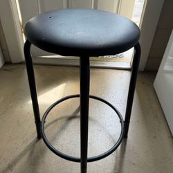 Black metal stool, faux, leather padded seat