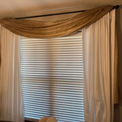 Set of 2 Gold curtain swags. 1 pictured over window. Many uses