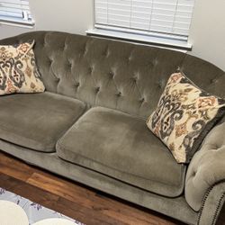 Tufted Sofa With Decorative Pillows 