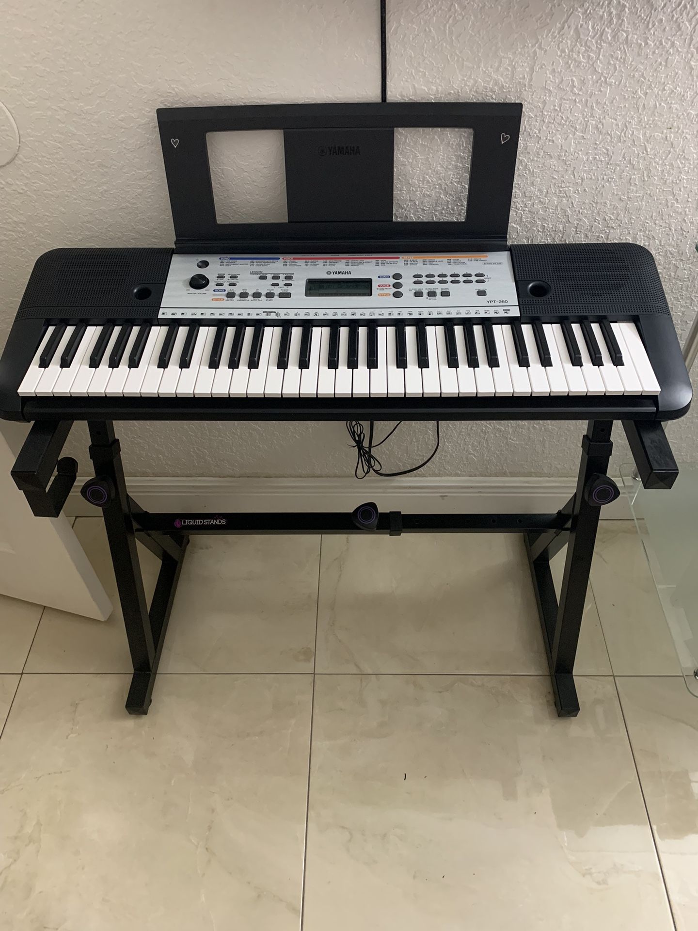 YAMAHA YPT 260 ELECTRONIC KEYBOARD AND STAND (160 usd)