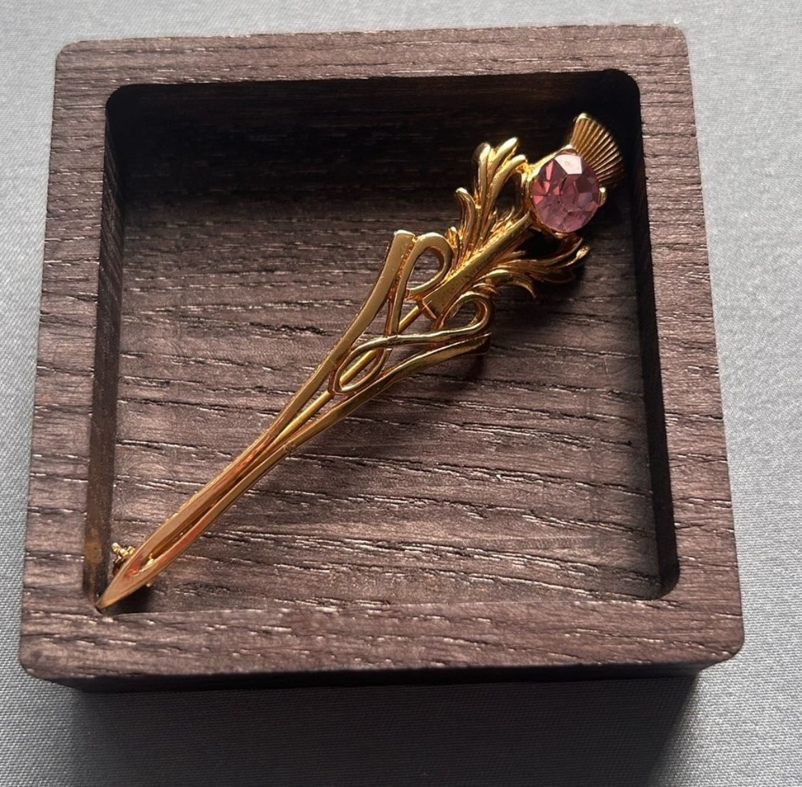 Gold Tone Brooch With Purple Rhinestone