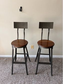 Brown wood and metal barstools