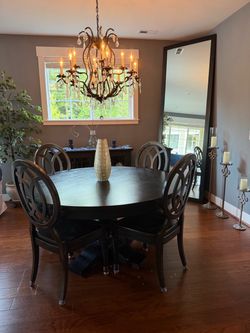 Restoration Hardware dining table, hutch and 6 Italian dining chairs.